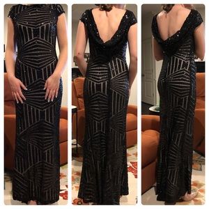 A black formal gown. Never worn.